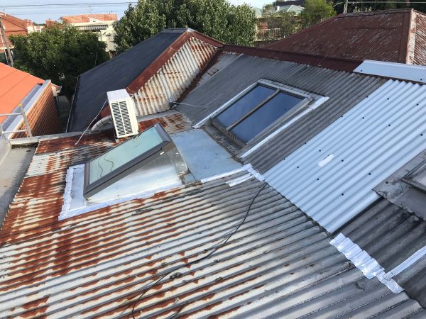 before rusted metal roof